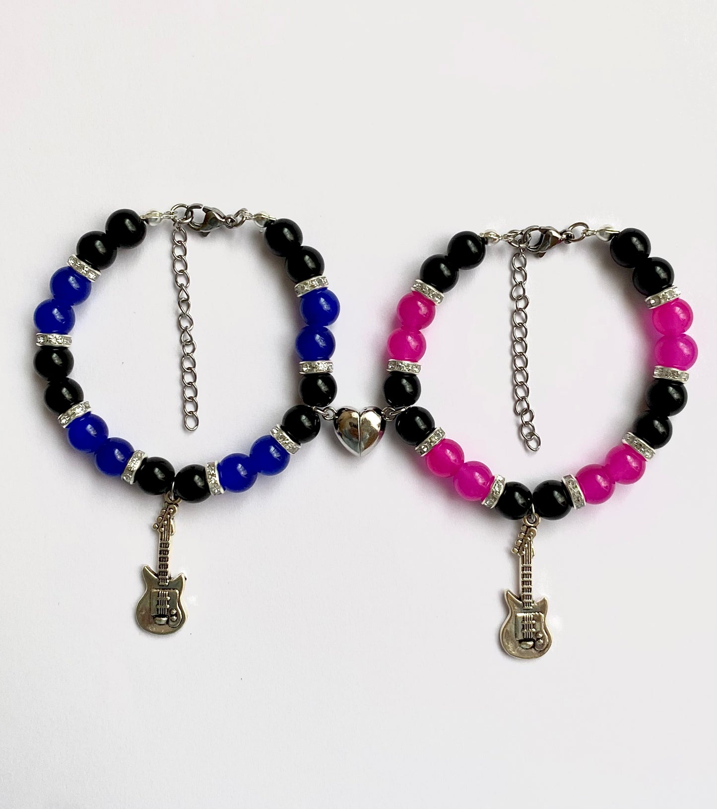 Tv girl matching bracelets with a heart magnet