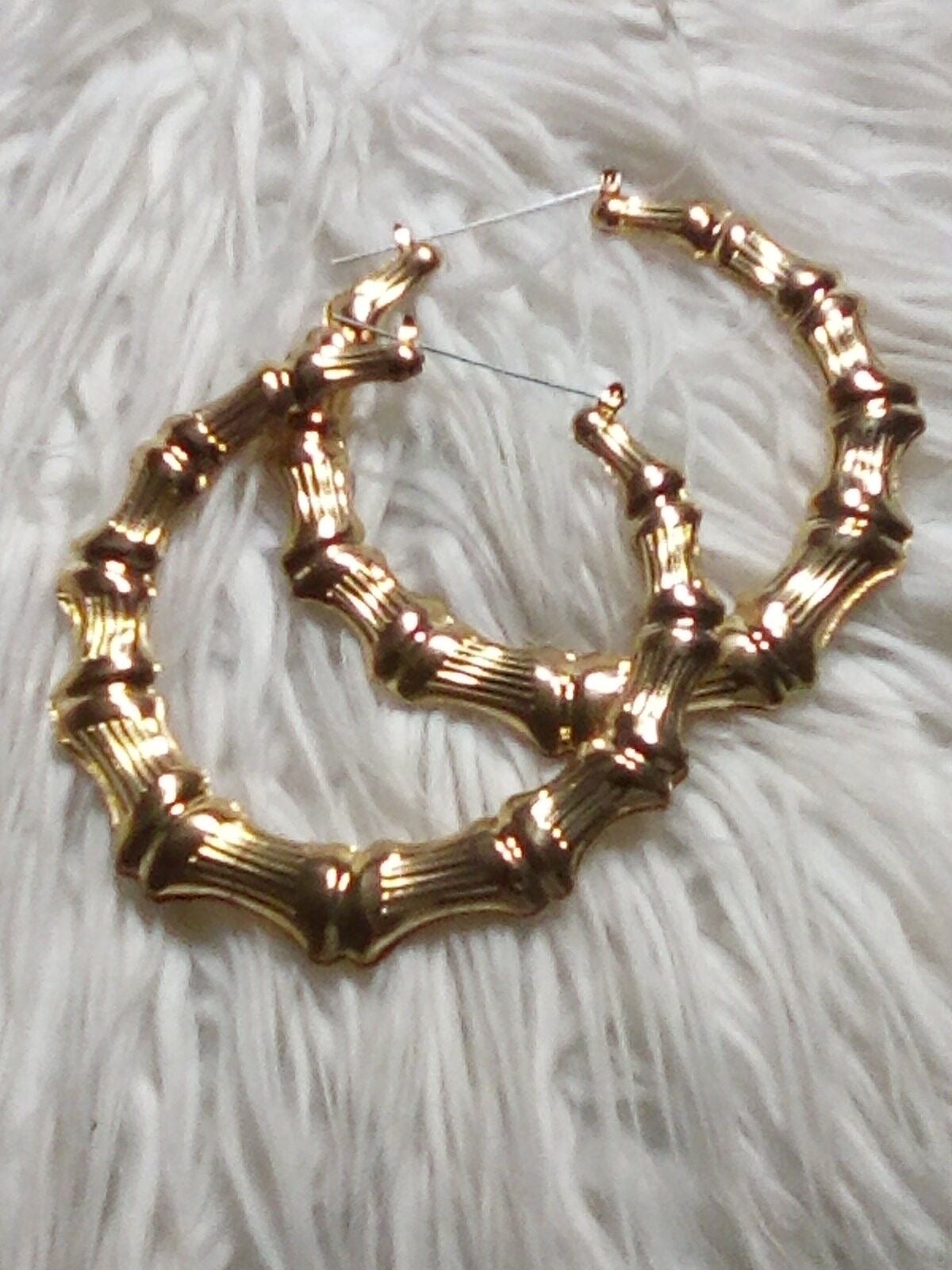 Big golden earrings